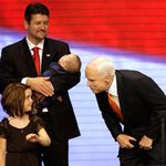McCain looks at Piper Palin, as Todd Palin (holding Trig Palin) looks on
